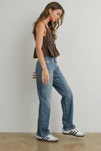 Load image into Gallery viewer, Woman wearing a brown top and blue jeans with white sneakers against a plain background