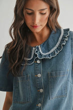 Load image into Gallery viewer, Woman wearing a denim dress with ruffled collar against a plain background