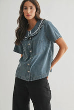 Load image into Gallery viewer, Woman wearing a denim shirt with lace trim on a plain background