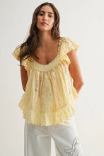 Load image into Gallery viewer, Woman wearing a yellow lace top and white pants on a plain background