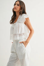 Load image into Gallery viewer, Woman wearing a white lace top and pants on a white background