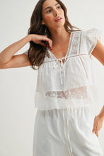 Load image into Gallery viewer, Woman wearing a white lace top and pants on a plain background
