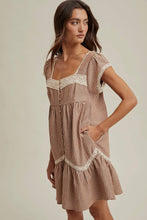 Load image into Gallery viewer, Woman wearing a beige dress with lace details on a neutral background