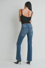 Load image into Gallery viewer, Person wearing blue jeans and a black top on a plain background