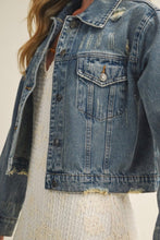 Load image into Gallery viewer, Close-up of a blue denim jacket with a neutral background
