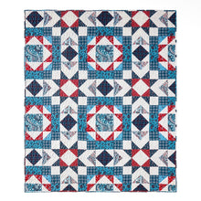 Load image into Gallery viewer, A square quilted blanket featuring a repeating patriotic block pattern with red, white, and blue fabrics, including plaid, floral, and geometric designs.