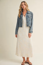 Load image into Gallery viewer, Woman wearing a denim jacket over a white dress on a plain background