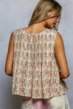 Load image into Gallery viewer, Woman wearing a floral sleeveless top against a plain background