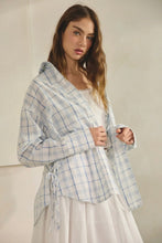 Load image into Gallery viewer, Woman wearing a light blue plaid robe over a white outfit against a neutral background