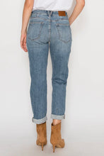 Load image into Gallery viewer, Person wearing light blue jeans and brown boots on a white background