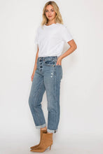 Load image into Gallery viewer, Woman wearing a white t-shirt and blue jeans against a white background