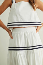 Load image into Gallery viewer, White dress with navy stripes worn by a person on a plain background