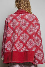 Load image into Gallery viewer, A person shown from the back wearing a red and white patterned quilted jacket with a solid red collar and hem, set against a plain light gray background.