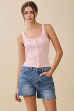 Load image into Gallery viewer, Woman wearing a pink tank top and denim shorts on a beige background