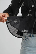 Load image into Gallery viewer, Black embroidered blouse with a white background