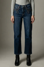 Load image into Gallery viewer, Person wearing dark blue jeans and black boots on a neutral background