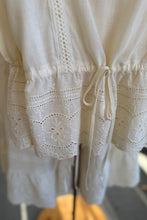 Load image into Gallery viewer, White lace dress on a mannequin with a blurred background