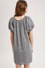 Load image into Gallery viewer, A woman shown from the back wearing a short-sleeve gray and white striped dress with a gathered neckline and puff sleeves, photographed against a plain light background.