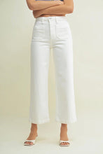 Load image into Gallery viewer, Person wearing white wide-leg jeans on a plain background