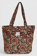 Load image into Gallery viewer, Floral patterned tote bag on a light gray background