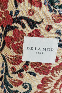 Floral patterned fabric with a 'De La Mur' label