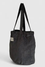 Load image into Gallery viewer, Black corduroy tote bag on a light gray background