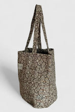 Load image into Gallery viewer, Tote bag with leaf pattern on a light gray background
