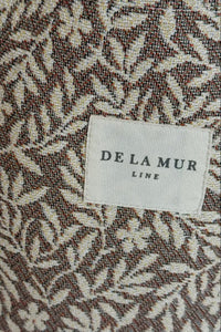Fabric with a subtle pattern and 'De La Mur' label