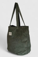 Load image into Gallery viewer, Green corduroy tote bag with a visible brand label on a light gray background