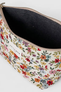 Floral-patterned pouch with a zipper on a white background