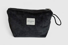 Load image into Gallery viewer, Black corduroy pouch with a visible brand label on a light gray background