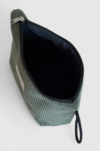 Green corduroy pouch with a zipper on a white background