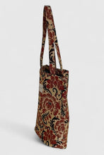Load image into Gallery viewer, Floral patterned tote bag on a light gray background
