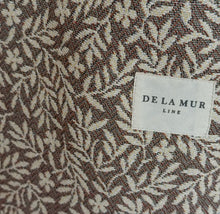 Load image into Gallery viewer, Fabric with a leaf pattern and &#39;De La Mur&#39; label