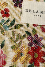 Load image into Gallery viewer, Floral patterned fabric with &#39;De La Mé&#39; label
