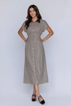 Load image into Gallery viewer, Woman wearing a checkered dress on a white background