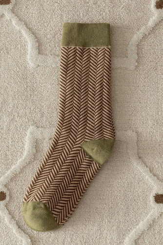 Patterned sock on a textured surface