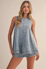 Load image into Gallery viewer, Woman wearing a denim dress and shorts on a beige background