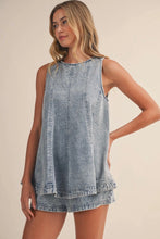 Load image into Gallery viewer, Woman wearing a denim dress on a beige background