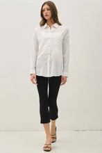 Load image into Gallery viewer, Woman wearing a white shirt and black pants on a white background