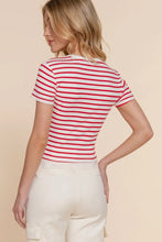 Load image into Gallery viewer, Woman wearing a red and white striped shirt against a beige background