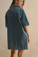 Load image into Gallery viewer, Woman wearing a denim dress against a beige background