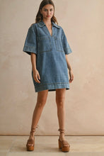 Load image into Gallery viewer, Woman wearing a denim dress against a beige background