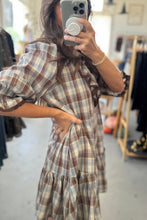 Load image into Gallery viewer, Person wearing a plaid dress in a clothing store