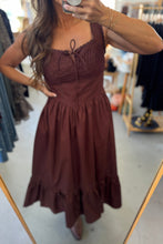 Load image into Gallery viewer, Person wearing a brown dress in a store setting