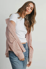 Load image into Gallery viewer, Woman wearing a white t-shirt and striped cardigan with blue jeans on a plain background