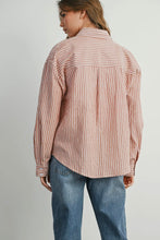 Load image into Gallery viewer, Person wearing a striped shirt and jeans on a plain background