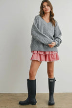 Load image into Gallery viewer, Woman wearing a gray sweater, red checkered skirt, and black rain boots against a plain background