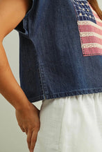 Load image into Gallery viewer, Denim vest with American flag patch worn by a person on a neutral background