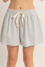 Load image into Gallery viewer, Striped shorts with a drawstring on a plain background